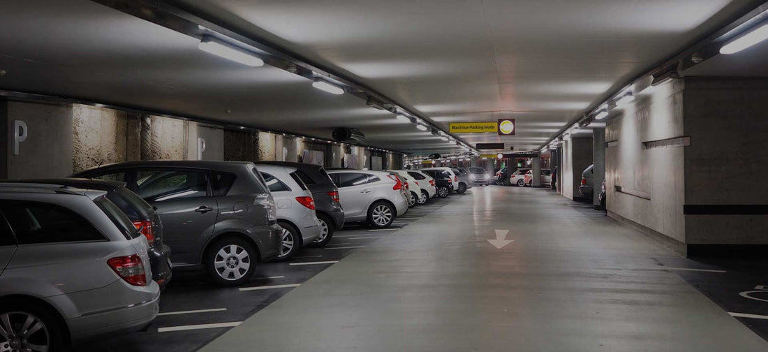 Car parked at night protected by dash cam parking mode